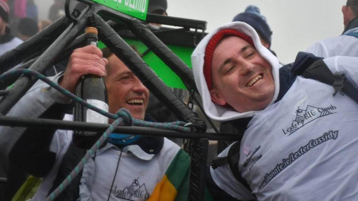 Lester and a friend celebrating on Croagh Patrick